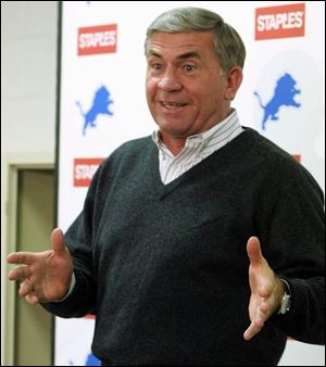 Detroit's Gary Moeller speaks at a news conference following his elevation to head coach. Moeller, who had been the Lions' assistant head coach, was given a three-year contract.