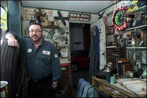 Mr. Taylor, a graphic designer at the Cedar Point amusement park, has redone one room to look like an office.