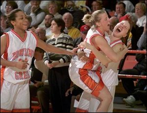 Bowling Green's Afra Smith goes up for a shot against Toledo's Mary Blessing. Smith scored 10 points in the Falcon victory.