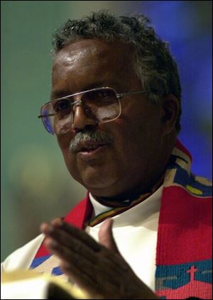 'We've got to keep meeting like this,' the Rev. W. Arthur Lewis tells a Toledo audience.