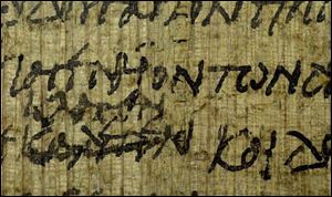 This papryi fragment from the 3rd or 4th century has a copy error and the correction. The writing is from Matthew 26:19-52.