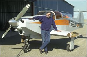 Jim Davis of Point Place built this experimental wooden plane in his garage. 