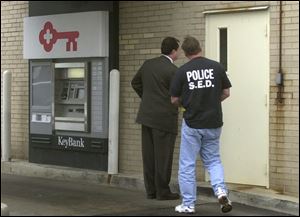 Authorities at the crime scene.