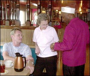 Owners Don Weiler, left, and his mother, Jane, with employee Thomas Taylor, say they're tired from the restaurant's demands.