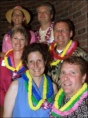 READY TO GO: Mary and Walt Kreuger, in the front, Gail and Mike Mahaffey, and Frances and Scott Parry, in the back, were planning their get-aways at the Great Escape party.