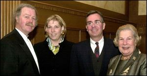 AN ARTISTIC CROWD: Sculptor Albert Paley, left, Kate and Scot MacPherson, and Carol Bentley of the Anderton Bentley Fund took in the festivities in the Toledo Club as guests honored the opening of the Georgia and David K. Welles Sculpture Garden.