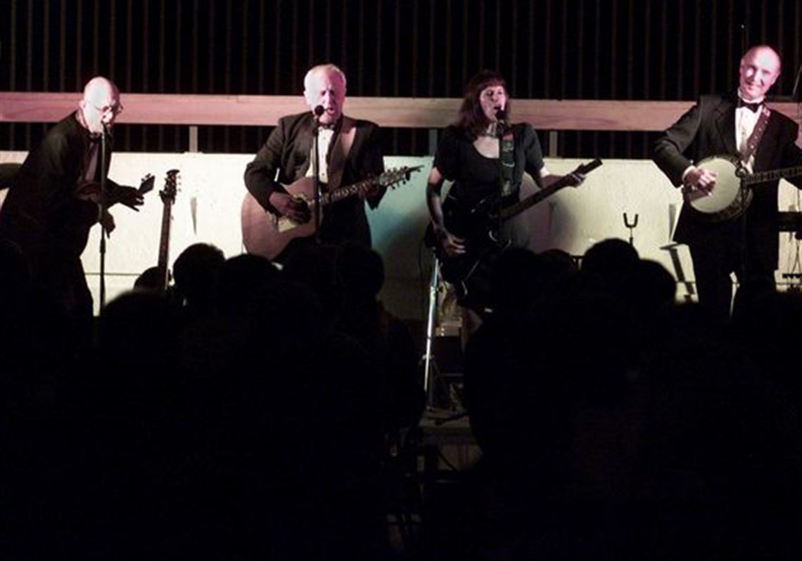 Larry Hays, left, Steve Scharren, Mike Robarge, and Patty and Joe Moran began their act 32 years ago.