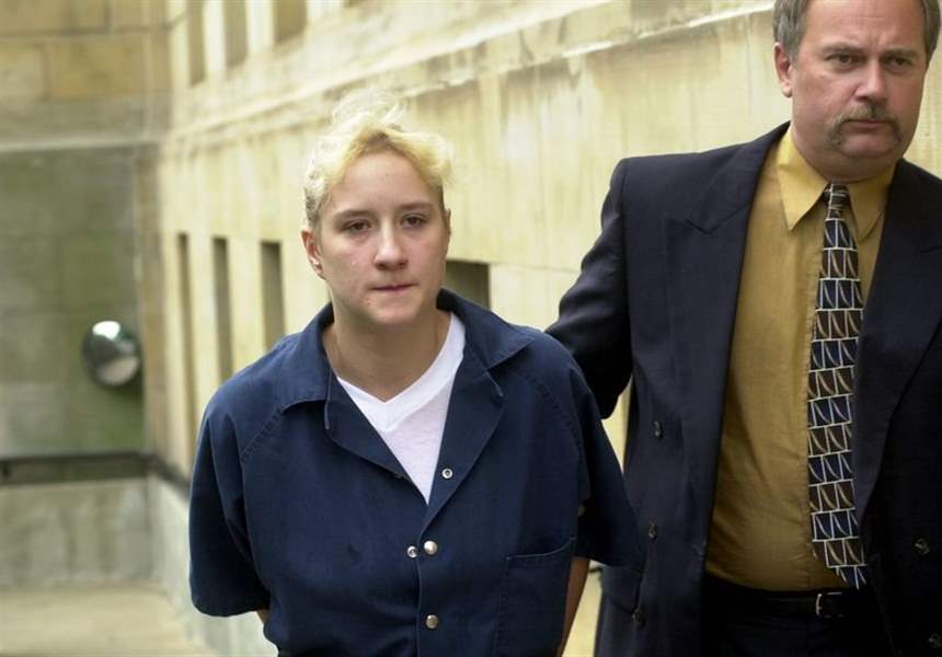 Pair-linked-to-slaying-appear-in-federal-court