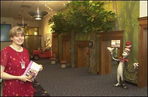 Librarian Nancy Eames has a greatly refurbished children's section.