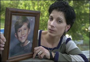 John, the eldest son of Carole Price of Manchester, Md., was killed at a friend's house on Aug. 20, 1998, by a child playing with a handgun.