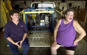 Deb Weihrauch, left, and Ellen Beach enjoy their reputations as the `bug ladies' in the communities they serve.