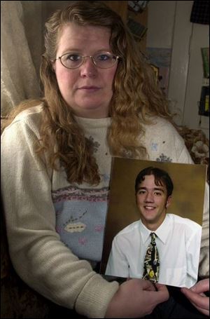 `Jeremiah would be here today if there had been reflectors on the railcars in front of him that night,' Laura Gomoll, with a photo of her stepson, wrote in a note to friends and relatives urging them to submit remarks to the Federal Railroad Administration. Jeremiah Gomoll died Dec. 22 when he drove his car into the side of a train.