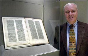 Dr. Allan Kirsner of Toledo contributed the leaf from the Gutenberg Bible at right to the museum exhibit.