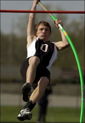 Otsego's Jeff Henck keeps his eye on the bar. A recent study revealed 15 vault-related fatalities among high school athletes during a 17-year period.