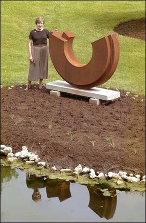 Peggy Grant, with a portion of the sculpture exhibit at Schedel Arboretum and Gardens, says she'd never visited the arboretum until she was asked to do a sculpture show there.