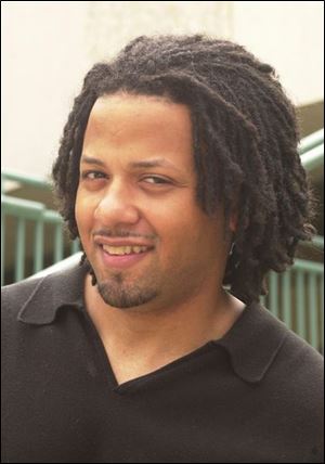 George Rice III says looks represent his African-American heritage.