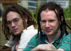 Chris Hatfield, left, and Alan Hoffar wear dreadlocks. Mr. Hatfield says it is a way to express himself.