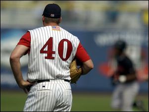 Toledo reliever Matt Perisho laments as the Indians' Elvis Pena rounds the bases on his two-run, eighth-inning home run.