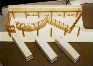 Model of new station along North Telegraph Road is shown with the roof off to show interior.