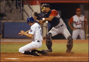 Mud Hens baserunners Michael Rivera (7) and Craig Wilson (8) both ended up on third base in the third inning, and both ended up being out on the play, which seemed symbolic of how Toledo's fine season ended.