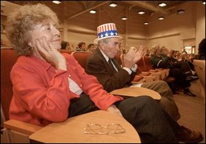 Naomi Twining and John Rust listen to the hopefuls at the University of Toledo.