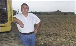 `It will be multipurpose,' says John Heltman, executive director of the Allen County Humane Society, which is leveling four acres behind its Elida Road shelter, in the background, for use by dog owners.