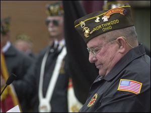 Veteran Don Griffith pauses as he addresses the audience at a Veterans Memorial dedication in Northwood. His story on Page 4.