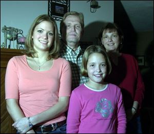 Ralph and Sherry Pierce, parents of Amanda, left, and Kyle, have ambitious plans for educating their daughters.