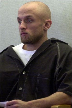 Thomas J. Hoskinson appears in Common Pleas Court for arraignment.