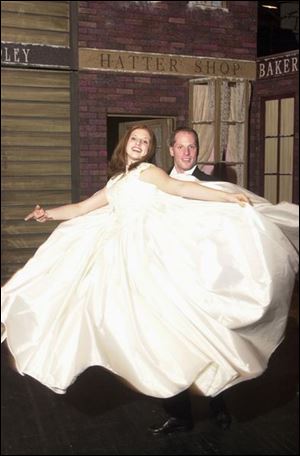 Cassie Dzienny, Paul Manger dance in `A Christmas Carol.'