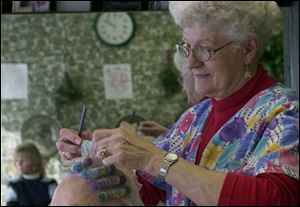 Gen Shatzer gets her hair styled by Kathryn Justus on the last day her beauty salon was open for customers after 52 years of business on Starr Avenue.