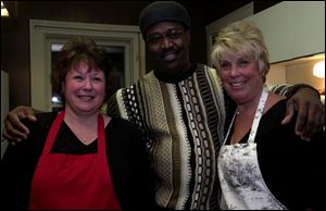 WORKING TOGETHER: Chairmen Sherry Kerstetter, left, and Marcia Helman,  right, are with chef Chris Bates at the Valentine Dinner by Candlelight.