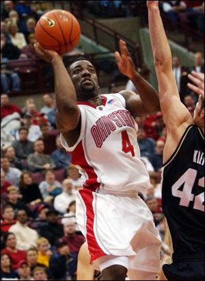 Ohio State's Brent Darby (4) goes up for a jump shot against Purdue's Matt Kiefer. Darby scored 16 points.
