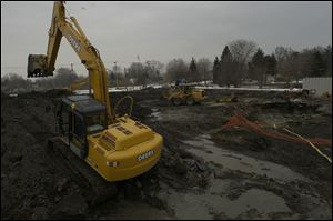 The city cleanup at the former Oakdale Greenhouse will take at least a week more.