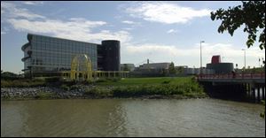 The Toledo-based building-products manufacturer entered Chapter 11 bankruptcy in 2000, burdened by liability for asbestos claims.