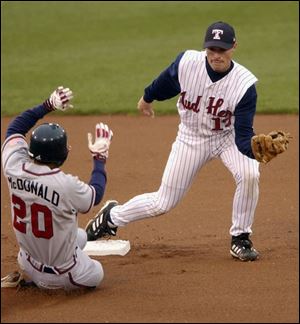 Toledo's Danny Klassen gets the force-out on Richmond's Donzell McDonald. Klassen had three hits, drove in two runs.