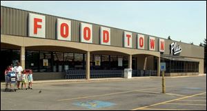 Shopping traffic was sparse at the store on Michigan Avenue in Waterville yesterday.