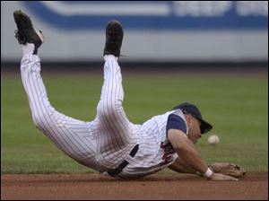 Mud Hens second baseman Kevin Jordan - in the lineup for the first time since June 23 - can't quite get to the ball as the Clippers' Nate Rolison winds up with a hit.