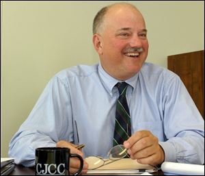 `It was an enticing opportunity to come out here,' says Mike Pevets, an Oak Harbor resident and new executive director of the Criminal Justice Coordinating Council.