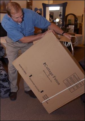 Mike Shea, of Toledo's Shea's Furniture and Sleep Shop chain, says Chinese imports are bargains for customers.
