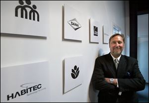 From logo to Web site, Terry Lesniewicz's company advises his clients on how to develop a consistent corporate image.