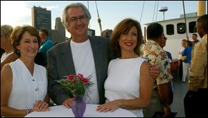 DESSERT PARTY: From left, Barb Berebitsky and Leo and Debbie Deiger are all smiles aboard the Caledonia.