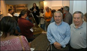 Brothers Ray and Herman Mainwold chose to auction off Mainline Kitchen & Bath Design Center so they could close.