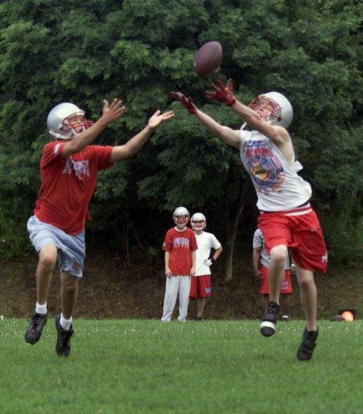 Breaking-huddle-High-School-practice-begins-2