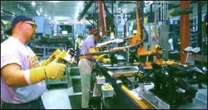 Acquisitions have benefited some parts firms, such as Johnson Controls, operator of this plant in Tennessee, and a member of the group one analyst calls specialists.