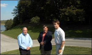 The Black Swamp Conservancy and its leaders including Phil Williams, its vice president; Paul Tait, its president, and Tim Schetter, its executive director, from left, have saved 2,300 acres including land that begins on the other side of the trees behind them.