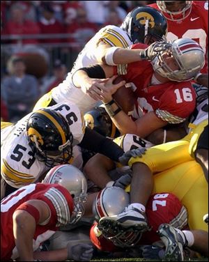 Ohio State's Craig Krenzel is stopped short of the goal line in the second quarter. Krenzel fumbled on the next play.  