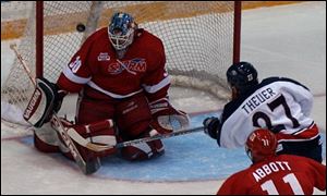 Toledo s Doug Teskey is beaten for a short-handed goal by Chad Theuer, but he stopped 25 others.