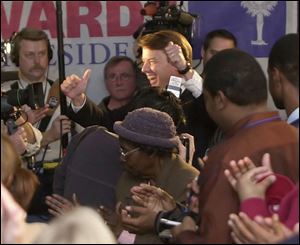 Sen. John Edwards of North Carolina arrives at South Carolina State University to court possible voters.