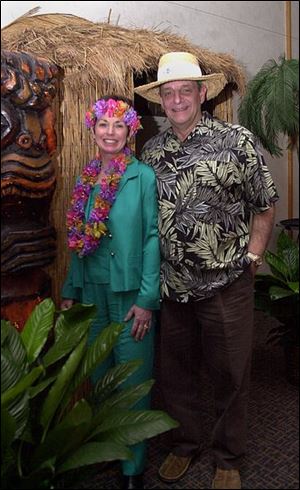 SURVIVORS: Not only are MaryAnn Kline and Robert Alexander surviving, they appear to be thriving in the tropical atmosphere.